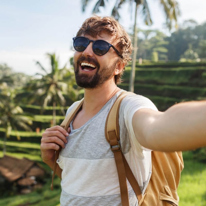 happy-stylish-caucasian-man-with-backpack-travel-i-2021-08-31-09-40-54-utc.jpg