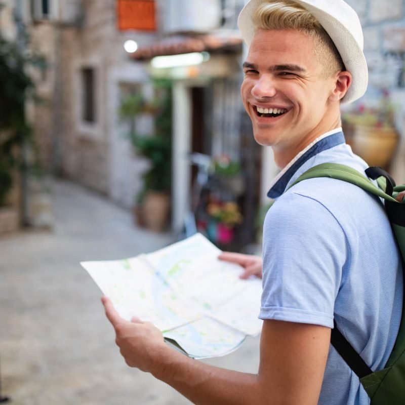 happy-young-man-smiling-and-traveling-at-summer-va-2021-08-30-02-33-41-utc.jpg